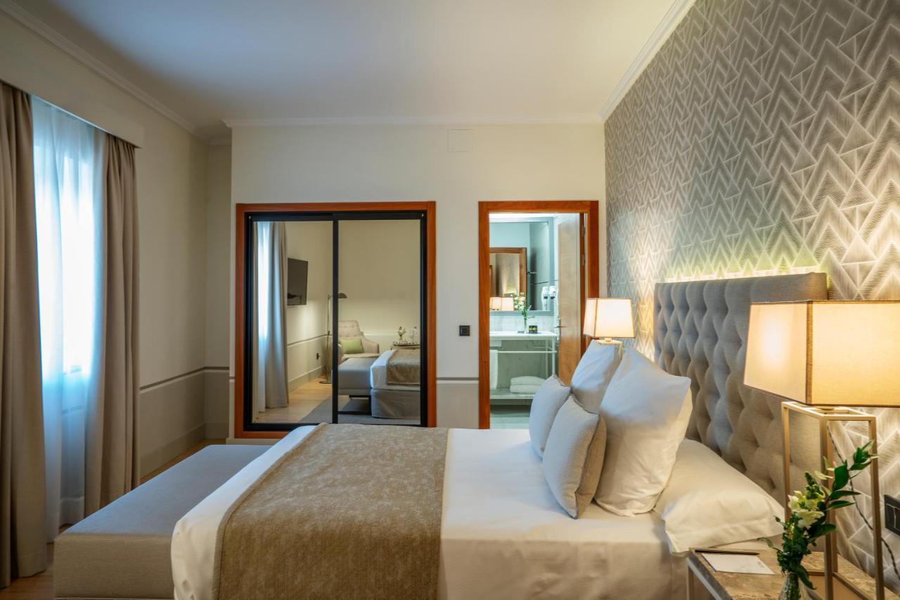 Hospes Palacio De Arenales & Spa Касерес Экстерьер фото A bedroom at the hotel