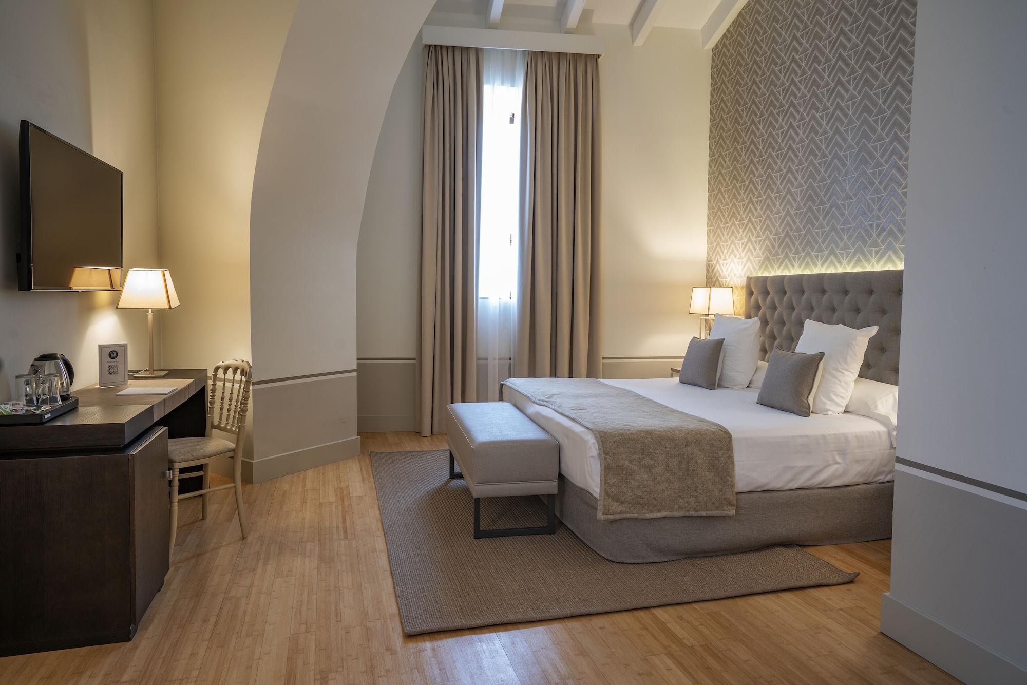 Hospes Palacio De Arenales & Spa Касерес Экстерьер фото A room at the hotel